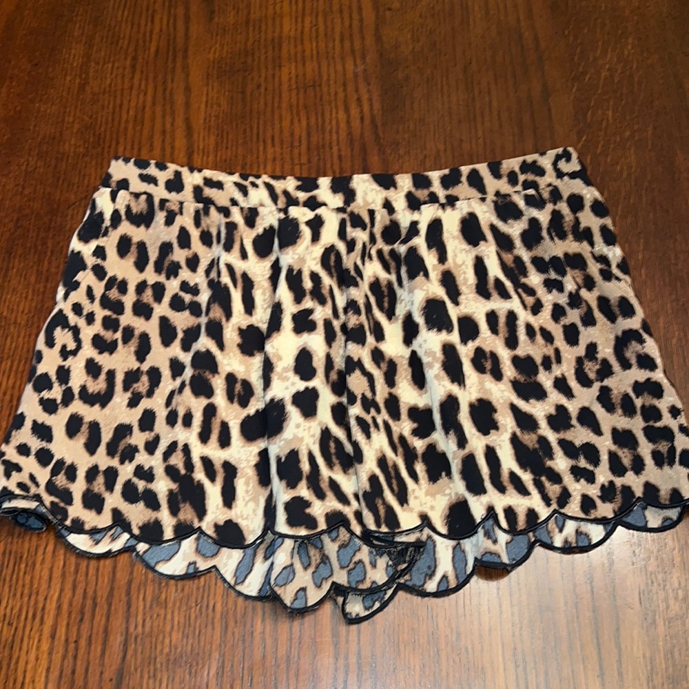 Size large cheetah print shorts with pockets!